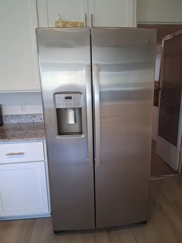 Stainless side-by-side refrigerator after a move-in cleaning in Thousand Oaks